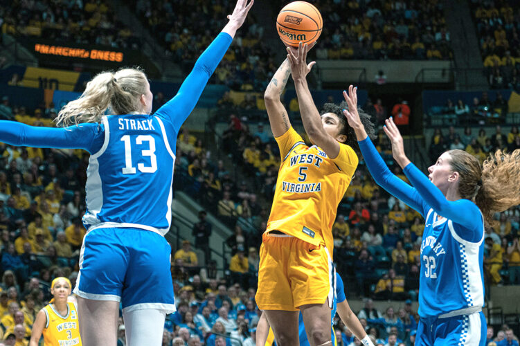 Kentucky holds off WVU, ending a historic season